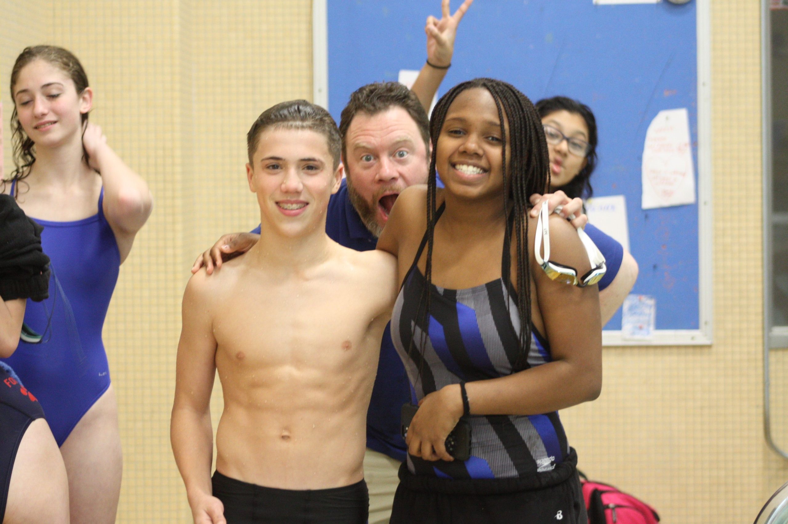 Coach sean with swimmers